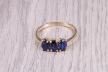 Load image into Gallery viewer, 1.50ct Royal Blue Sapphire Trilogy set Ring, Made From 9ct Yellow Gold, British Hallmarked