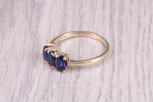 Load image into Gallery viewer, 1.50ct Royal Blue Sapphire Trilogy set Ring, Made From 9ct Yellow Gold, British Hallmarked