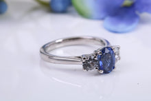 Load image into Gallery viewer, Blue and White Sapphire Platinum Trilogy Ring, One carat Natural Sapphire and 0.60ct White Sapphire, British Hallmarked