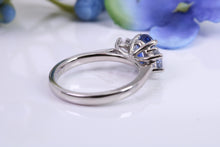 Load image into Gallery viewer, Blue and White Sapphire Platinum Trilogy Ring, One carat Natural Sapphire and 0.60ct White Sapphire, British Hallmarked