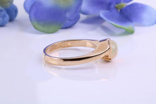 Load image into Gallery viewer, Oval cut Natural Opal set in Chunky Crossover Yellow Gold Ring