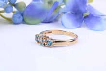 Load image into Gallery viewer, Sky Blue Topaz and Diamond set Yellow Gold Ring