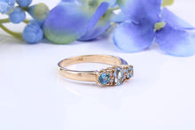 Load image into Gallery viewer, Sky Blue Topaz and Diamond set Yellow Gold Ring