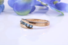 Load image into Gallery viewer, Sky Blue Topaz set Yellow Gold Twist Shank Ring