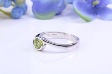 Load image into Gallery viewer, Half carat Peridot set 18ct White Gold Ring