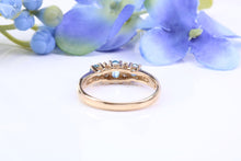 Load image into Gallery viewer, Sky Blue Topaz and Diamond set Yellow Gold Ring