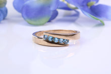 Load image into Gallery viewer, Sky Blue Topaz set Yellow Gold Twist Shank Ring