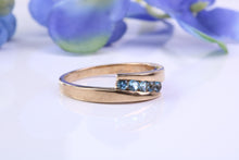 Load image into Gallery viewer, Sky Blue Topaz set Yellow Gold Twist Shank Ring