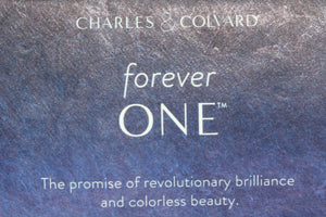 Elegant Charles and Colvard 1 carat Forever One graded Mossainte platinum solitaire