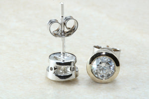 Elegant diamond solitaire stud earings,real round cut diamonds set in 18ct white gold, perfect for everyday wear.Ideal gift for any occasion