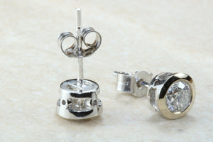 Elegant diamond solitaire stud earings,real round cut diamonds set in 18ct white gold, perfect for everyday wear.Ideal gift for any occasion