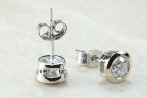 Elegant diamond solitaire stud earings,real round cut diamonds set in 18ct white gold, perfect for everyday wear.Ideal gift for any occasion