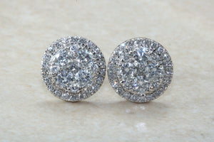 Dressy diamond cluster stud earings,natural round cut diamonds set in 18ct white gold. This has to be the perfect gift for any occasion