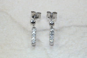 Diamond set dropper earrings. 18ct Gold with Latchback fittings.Perfect gift solution for any occasion. F VS1 grade Diamonds