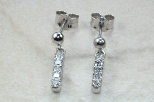Diamond set dropper earrings. 18ct Gold with Latchback fittings.Perfect gift solution for any occasion. F VS1 grade Diamonds