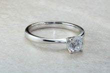 Load image into Gallery viewer, Forever One graded Charles and Colvard Mossainte set in this simple, elegant and timeless platinum solitaire