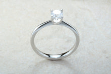 Load image into Gallery viewer, Forever One graded Charles and Colvard Mossainte set in this simple, elegant and timeless platinum solitaire