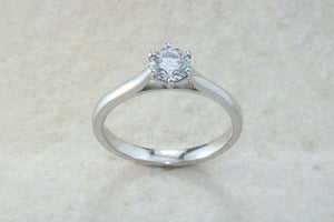 Elegant Charles and Colvard 1 carat Forever One graded Mossainte platinum solitaire