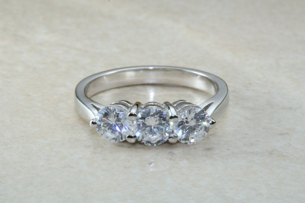 Very dressy Trilogy ring with Charles and Colvard Mossainte diamonds,3 carat weight, Forever One grade diamond's,top colour and clarity