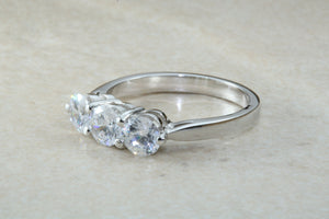 Very dressy Trilogy ring with Charles and Colvard Mossainte diamonds,3 carat weight, Forever One grade diamond's,top colour and clarity