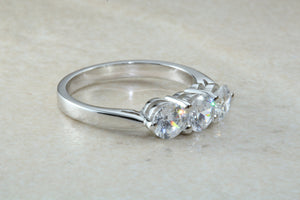 Very dressy Trilogy ring with Charles and Colvard Mossainte diamonds,3 carat weight, Forever One grade diamond's,top colour and clarity