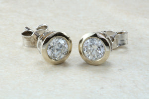 Elegant diamond solitaire stud earings,real round cut diamonds set in 18ct white gold, perfect for everyday wear.Ideal gift for any occasion