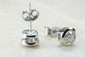 Elegant diamond solitaire stud earings,real round cut diamonds set in 18ct white gold, perfect for everyday wear.Ideal gift for any occasion