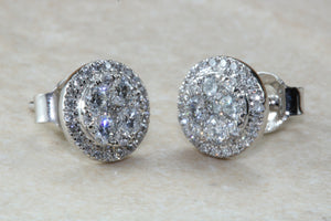 Dressy diamond cluster stud earings,natural round cut diamonds set in 18ct white gold. This has to be the perfect gift for any occasion