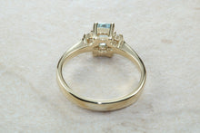 Load image into Gallery viewer, This combination of Diamond and blue Topaz trilogy ring is sure to be the gift of choice. solid 9ct yellow gold. Just the perfect gift