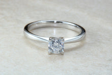 Load image into Gallery viewer, Forever One graded Charles and Colvard Mossainte set in this simple, elegant and timeless platinum solitaire