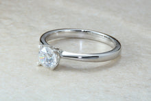 Load image into Gallery viewer, Forever One graded Charles and Colvard Mossainte set in this simple, elegant and timeless platinum solitaire