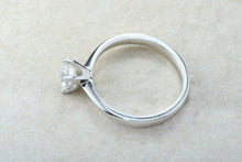 Load image into Gallery viewer, Forever One graded Charles and Colvard Mossainte set in this simple, elegant and timeless platinum solitaire