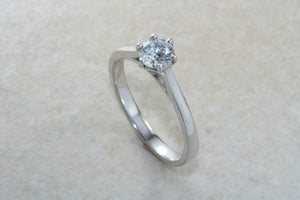 Elegant Charles and Colvard 1 carat Forever One graded Mossainte platinum solitaire