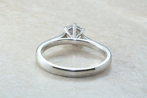 Elegant Charles and Colvard 1 carat Forever One graded Mossainte platinum solitaire