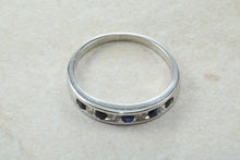 Load image into Gallery viewer, Simple and dainty blue Sapphire and Diamond set eternity ring,natural blue sapphire and diamonds set in 9ct white gold, perfect for all ages
