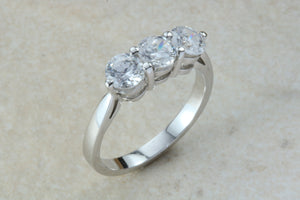 Very dressy Trilogy ring with Charles and Colvard Mossainte diamonds,3 carat weight, Forever One grade diamond's,top colour and clarity
