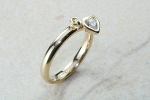 Petite yellow gold band with heart dropper, solid 9ct yellow gold and heart cubic zirconia. Perfect dress ring, ideal gift for any occasion