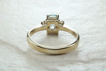 Load image into Gallery viewer, This combination of Diamond and blue Topaz trilogy ring is sure to be the gift of choice. solid 9ct yellow gold. Just the perfect gift