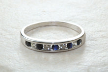 Load image into Gallery viewer, Simple and dainty blue Sapphire and Diamond set eternity ring,natural blue sapphire and diamonds set in 9ct white gold, perfect for all ages