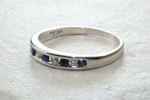 Load image into Gallery viewer, Simple and dainty blue Sapphire and Diamond set eternity ring,natural blue sapphire and diamonds set in 9ct white gold, perfect for all ages