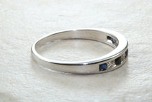 Load image into Gallery viewer, Simple and dainty blue Sapphire and Diamond set eternity ring,natural blue sapphire and diamonds set in 9ct white gold, perfect for all ages