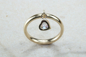 Petite yellow gold band with heart dropper, solid 9ct yellow gold and heart cubic zirconia. Perfect dress ring, ideal gift for any occasion