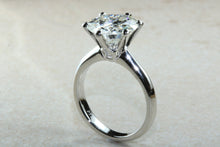 Load image into Gallery viewer, 3 carat round Forever One Moissanite Diamond solitaire. Charles and Colvard 9.50 mm round set in classic 6 claw platinum engagement ring