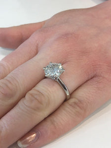 3 carat round Forever One Moissanite Diamond solitaire. Charles and Colvard 9.50 mm round set in classic 6 claw platinum engagement ring
