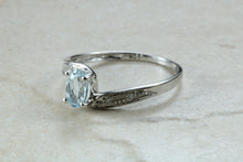 Load image into Gallery viewer, Blue topaz and diamond set twist ring. 9ct White gold with real diamonds and real topaz