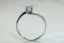 Load image into Gallery viewer, Blue topaz and diamond set twist ring. 9ct White gold with real diamonds and real topaz