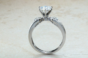 Stunning Charles and Colvard One carat Forever One Mossainte with natural diamonds set in this beautiful 18ct white gold ring