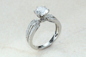 Stunning Charles and Colvard One carat Forever One Mossainte with natural diamonds set in this beautiful 18ct white gold ring
