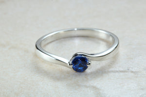 Dainty silver solitaire ring set with beautiful round Sapphire C Z, birthstone for May,ideal as promise ring. Perfect gift for all occasions