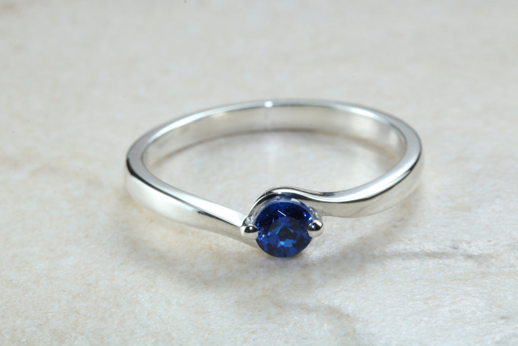 Dainty silver solitaire ring set with beautiful round Sapphire C Z, birthstone for May,ideal as promise ring. Perfect gift for all occasions